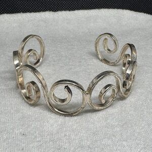 Elegant Silver Swirl Cuff Bracelet